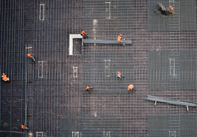 Bilde av bygningsarbeidere sett ovenfra