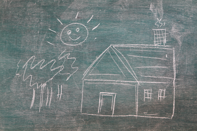 image of drawn house on a blackboard