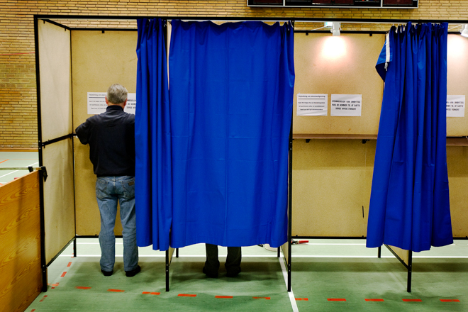 image of man in election booth