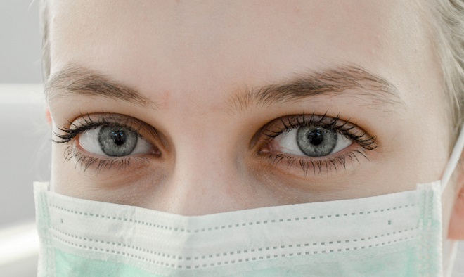 A woman with a facemask